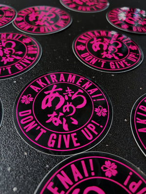 Akiramenai Sticker